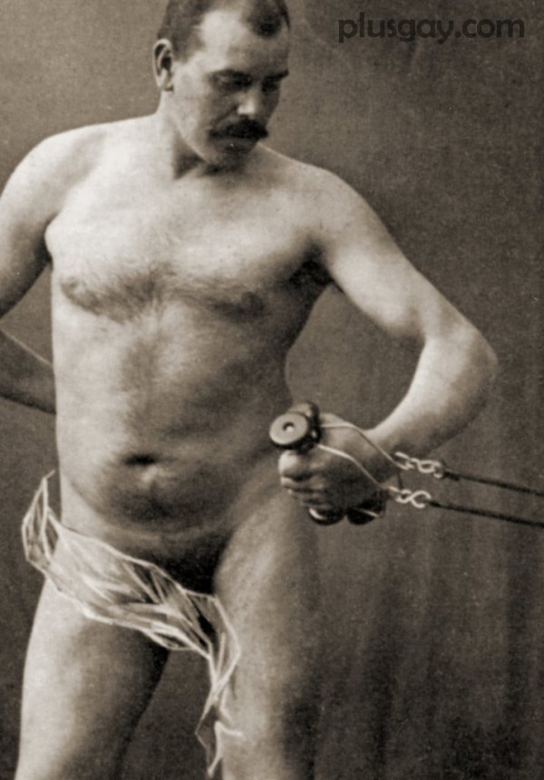  Nude male holding the handle of a cable machine c1910 (sepia (MeisterDrucke 636213)